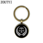 1 Judge Golden Balance Justice Messenger Men's Keychain High Quality Silver Glass Keychain Men's Gift.