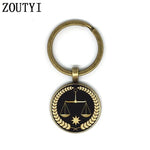 1 Judge Golden Balance Justice Messenger Men's Keychain High Quality Silver Glass Keychain Men's Gift.